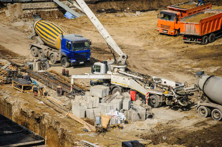 construction site from top view with trucks and bulldozerの写真素材