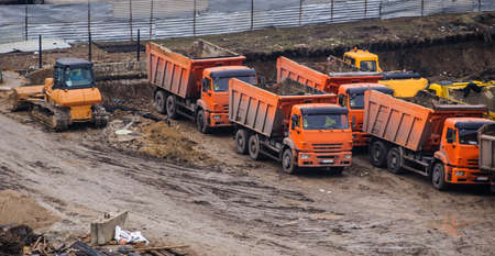 construction site from top view with trucks and bulldozer, craneの写真素材