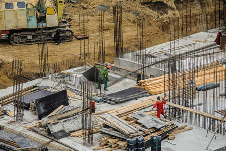The group of workers working at a construction site. Top viewの写真素材