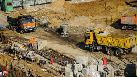 construction site from top view with trucks and bulldozerの写真素材