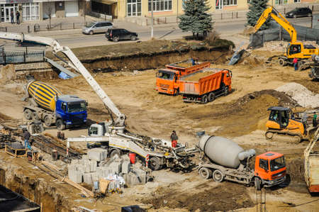 construction site from top view with trucks and bulldozerの写真素材
