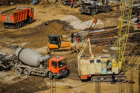 construction site from top view with trucks and bulldozer, craneの写真素材