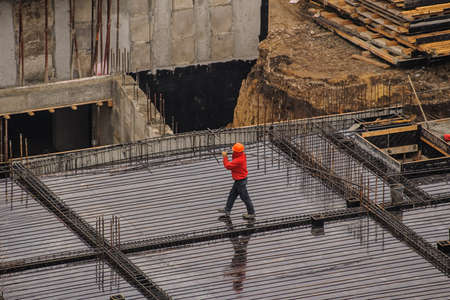 The group of workers working at a construction site. Top viewの写真素材
