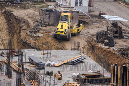 construction site from top view with trucks and bulldozer, craneの写真素材
