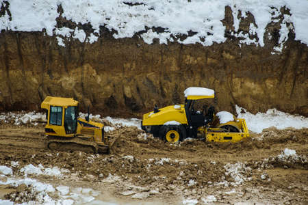 Construction of the road. Paving. Compaction of the road.の写真素材