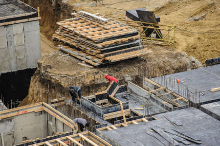 The group of workers working at a construction site. Top viewの写真素材