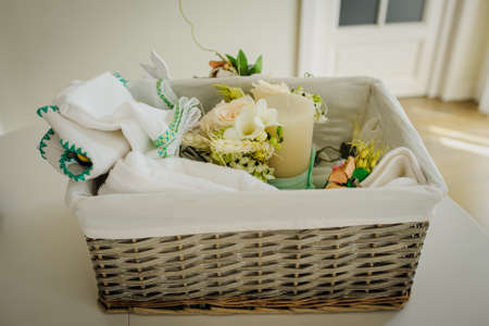 Decoration wood basket with wheat, candle, rabbit and dry orange. の写真素材