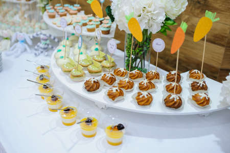 Top view of fruit jelly in glasses and sweet cookiesの写真素材