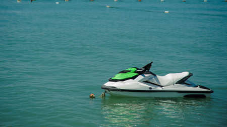 motor boats in the seaside in summer green waterの写真素材