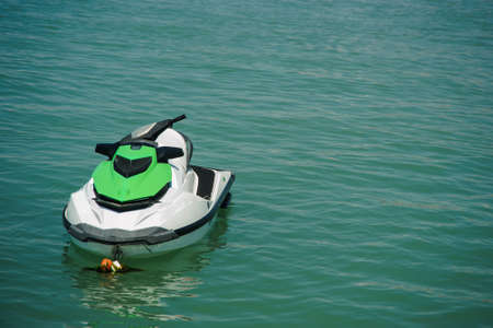 motor boats in the seaside in summer green waterの写真素材