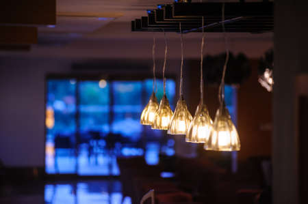 chandelier light in night in a restaurant during vacationの写真素材