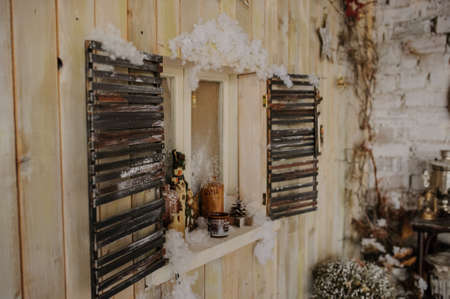 wood wall with window decorated for photo sessionの写真素材