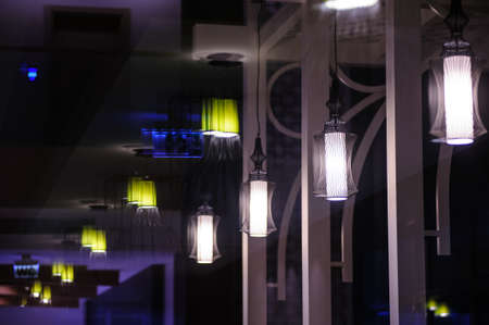 chandelier light in night in a restaurant during vacationの写真素材