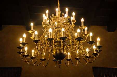 Old Antique Ceiling light. Vintage light candles hanging from ceilingsの写真素材