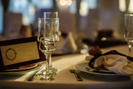 White cutlery arranged on a table for a eventの写真素材