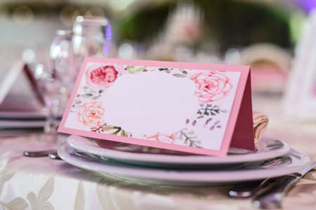 White cutlery arranged on a table for a eventの写真素材