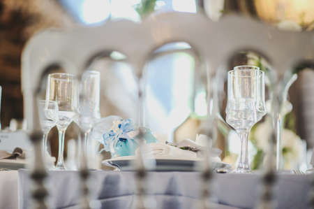 Glasses prepared for the event on the table, close viewの写真素材