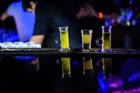 Preparation glasses with cocktails of fruit close viewの写真素材