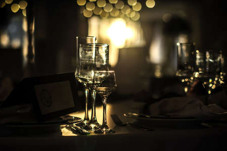 White cutlery arranged on a table for a eventの写真素材