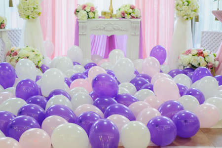 Decoration with white, pink and purple balloons for a weddingの写真素材