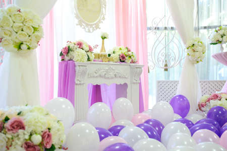 Decoration with white, pink and purple balloons for a weddingの写真素材