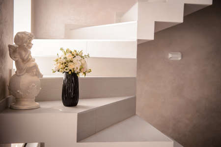 A flower bouquet on the white marble staircase, close viewの写真素材