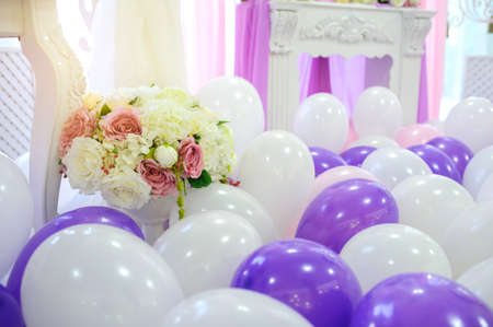 Decoration with white, pink and purple balloons for a weddingの写真素材