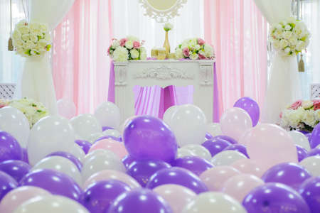 Decoration with white, pink and purple balloons for a weddingの写真素材