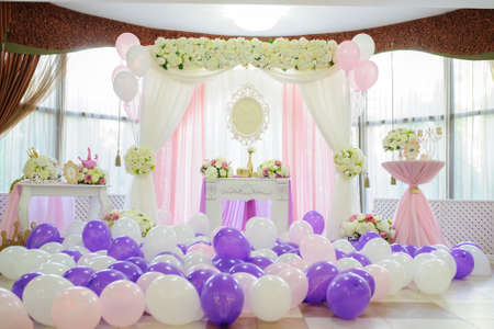 Decoration with white, pink and purple balloons for a weddingの写真素材
