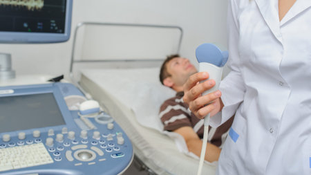 The doctor using the ultrasonography device, close view