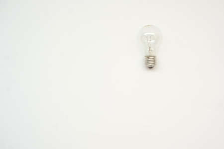 A light bulb, close view, white backgroundの写真素材
