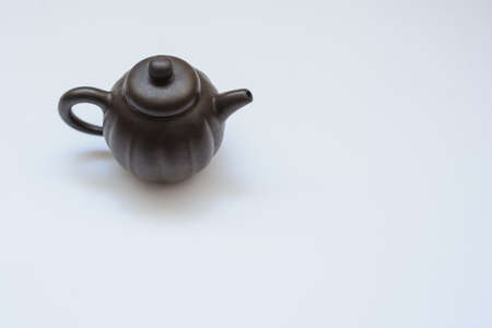 A ceramic kettle, close view, white backgroundの写真素材
