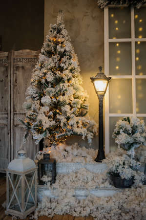 Photography studio with christmass decorations and vintage streetlampsの写真素材