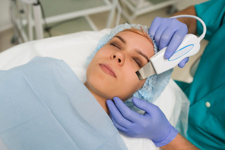 closeup of a woman getting facial ultrasound cleaning