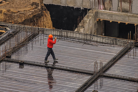 The group of workers working at a construction site. Top viewの写真素材