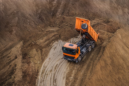 truck working hard at the contruction siteの写真素材