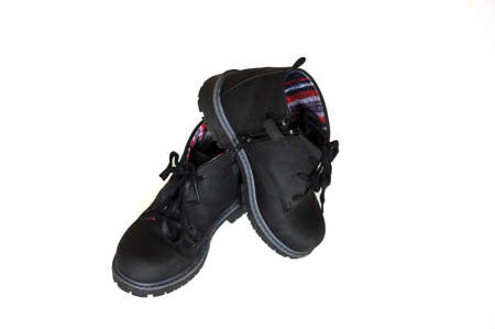 closeup black autumn boots with laces for boysの写真素材