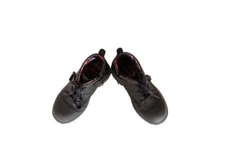 closeup black autumn boots with laces for boysの写真素材