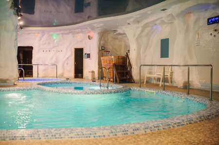 the interior of the aquazone in a spa salon: swimming pool and a janapese tubeの写真素材