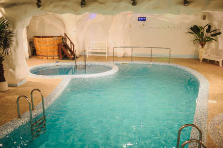 the interior of the aquazone in a spa salon: swimming pool and a janapese tubeの写真素材