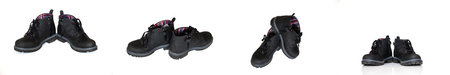 A series of black autumn boots with laces for boys in different angles of view on white background.の写真素材