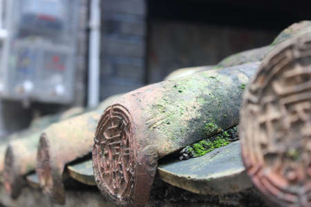 Close up to an ancient building roof tileの写真素材