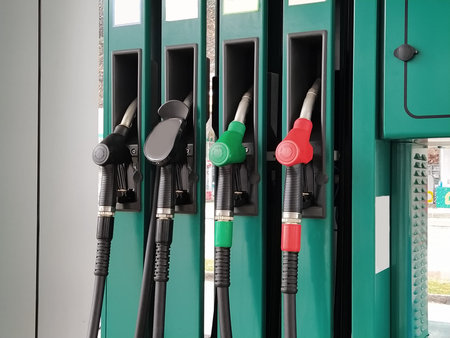 Gas Station Pumps. Modern Service Station. A service concept. Colorful Petrol pump filling nozzles....