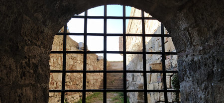 Tight shot photo of fortress tower. Belgrade, Serbia. Kalemegdan fortress. Metal grill in the...
