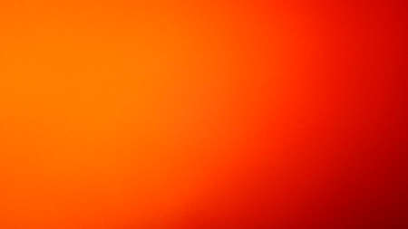 Beautiful vibrant orange red background with gradient. Banner background.の写真素材