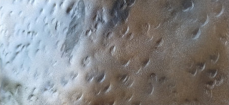 Bronze metal surface. Uneven metal texture with scratches, gouges and dents. Red, brown, orange,...