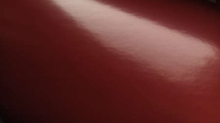 Gradient on a burgundy background. Glossy paper or foil folded diagonally with overflow and highlights. Soft corner light. A mysterious glow. Metallic luster. Bannerの写真素材