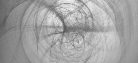 Abstract futuristic mysterious background similar to a veil, cobwebs or tangled blood vessels of the human body. Monochrome defocused image. Frosted glass with streaks and rounded backlit stripesの写真素材