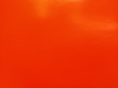red - orange background. Beautiful bright color. Gradient and highlights. Sunny shadesの写真素材