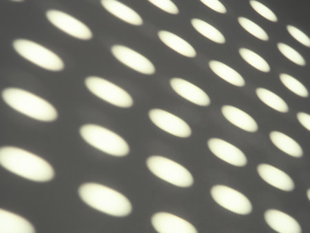 abstract sun bunnies, dots and ovals on gray background. Retro disco style. Abstract backdrop with...